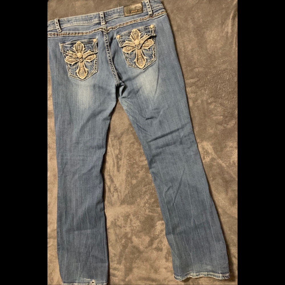 Bootcut blue jeans, decorated pocket